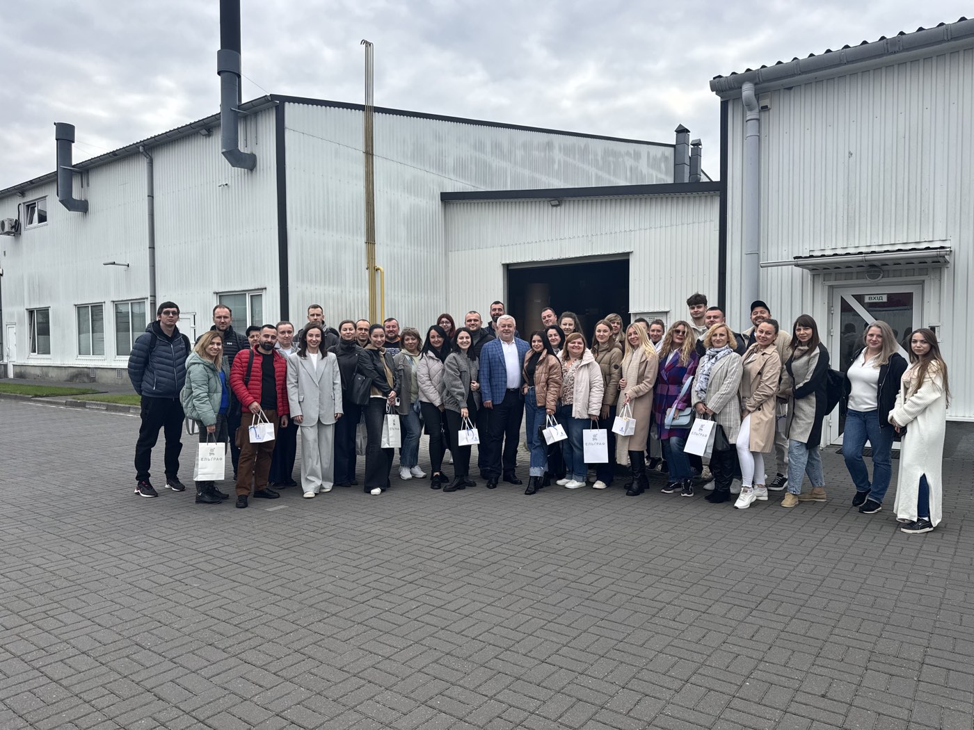 The Elgraf team in front of the production site